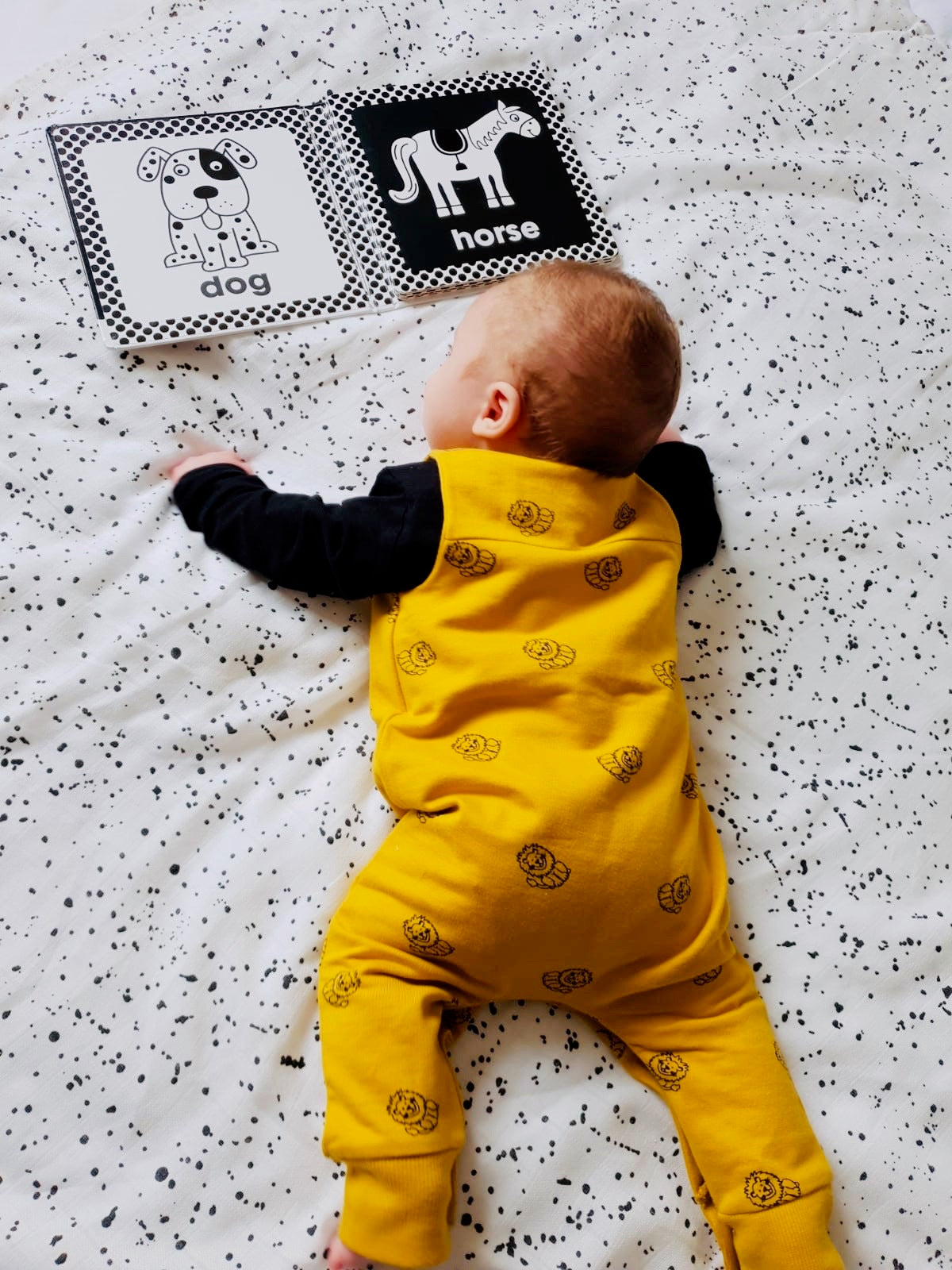 Unisex lion all over print baby romper