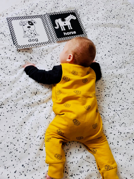 Unisex lion all over print baby romper