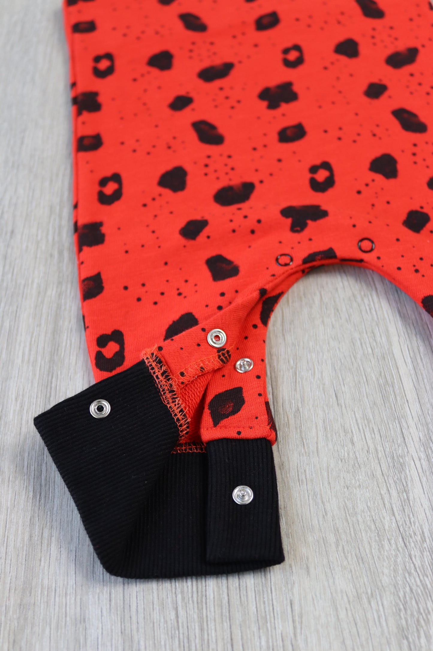 Deep Orange / Red animal print unisex baby romper